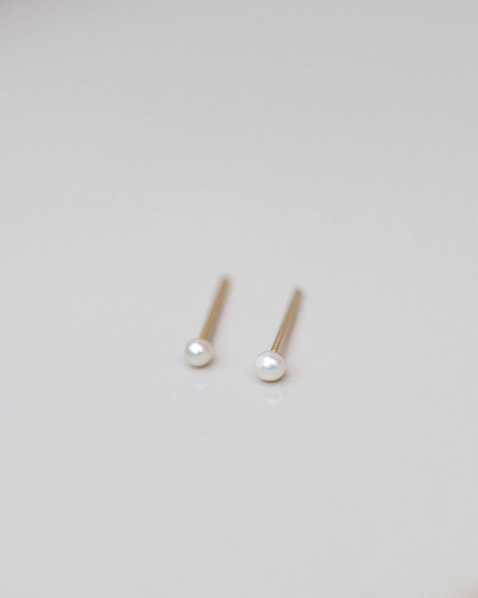 14k Mini Pearl Studs