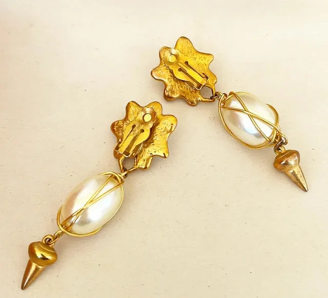 1980’s large clip on faux pearl dangling earrings.