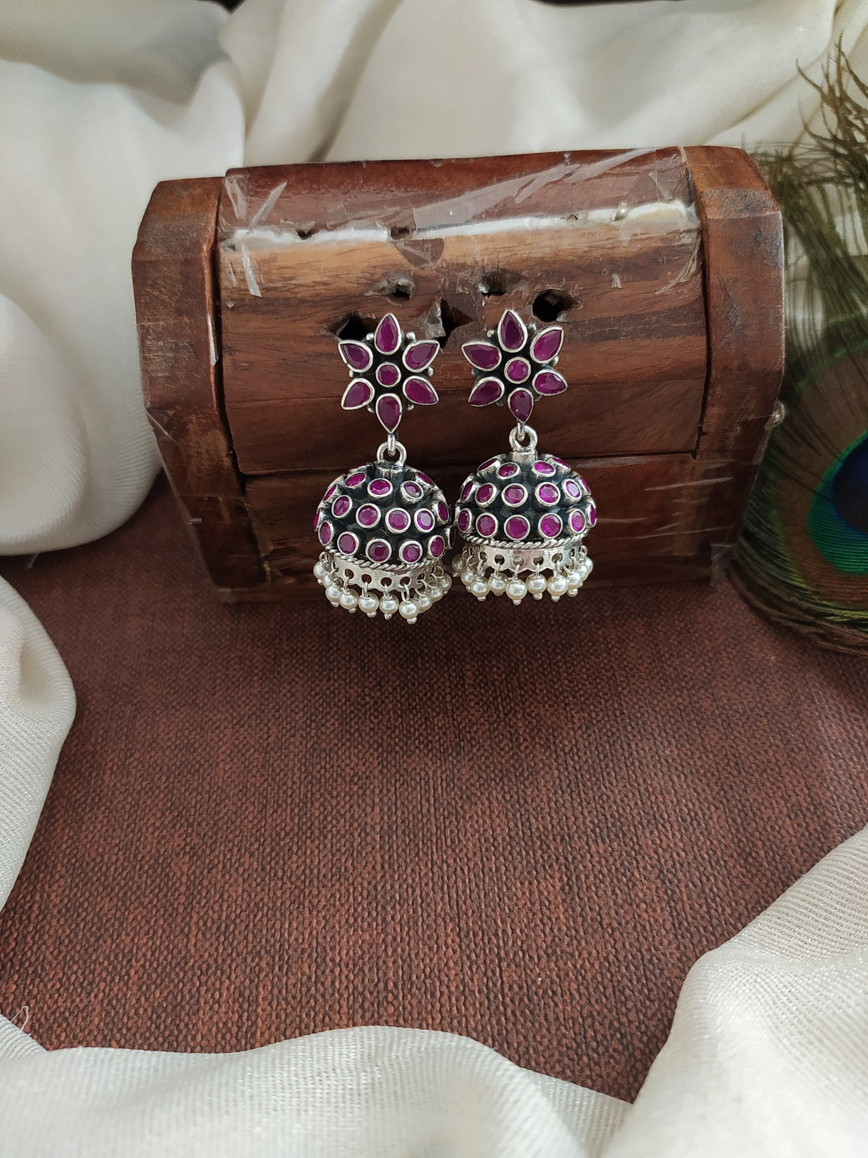 92.5 Pure Silver Jhumki in Oxidized Finish with Stones and Pearl Drops