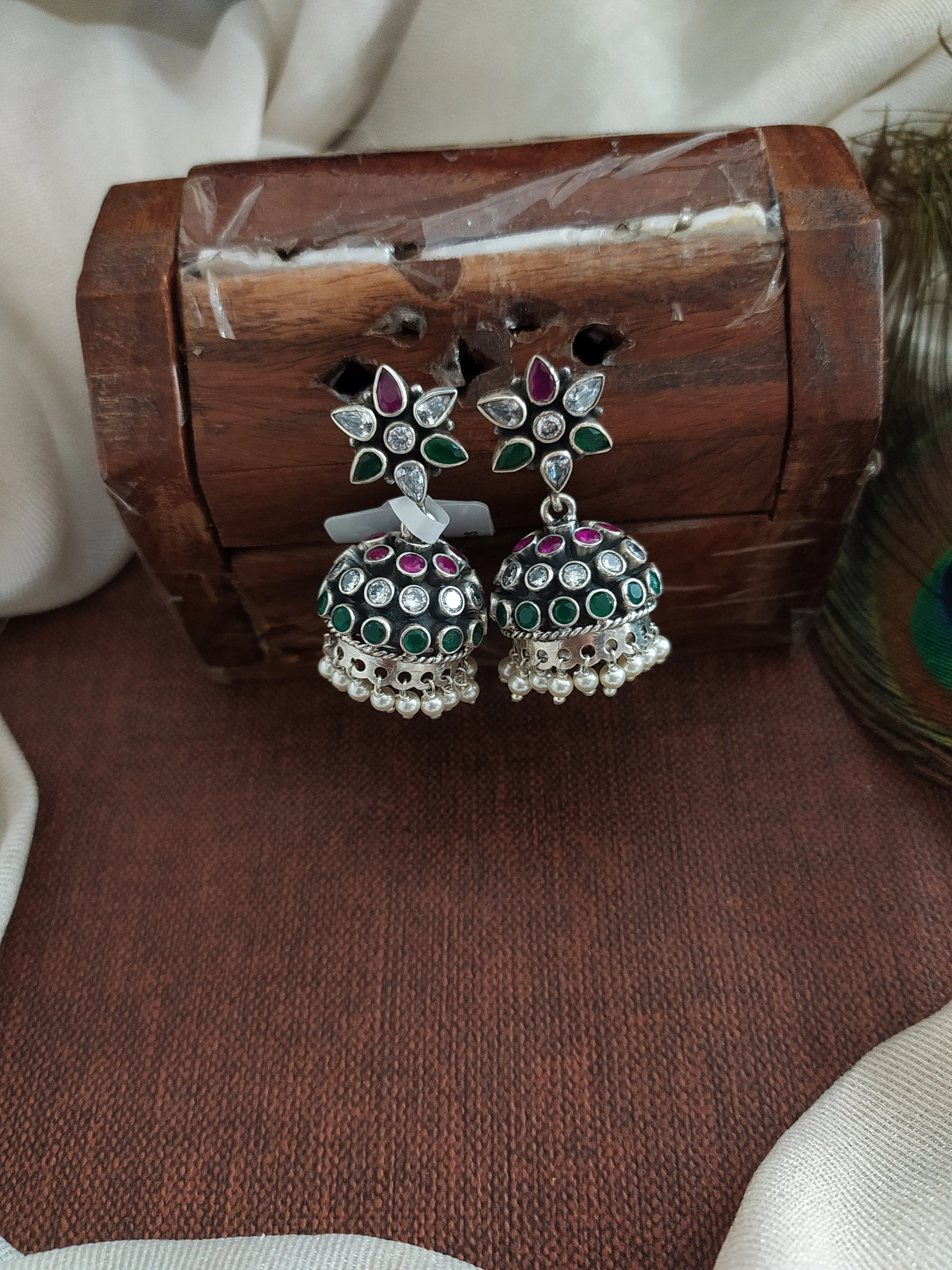 92.5 Pure Silver Jhumki in Oxidized Finish with Stones and Pearl Drops