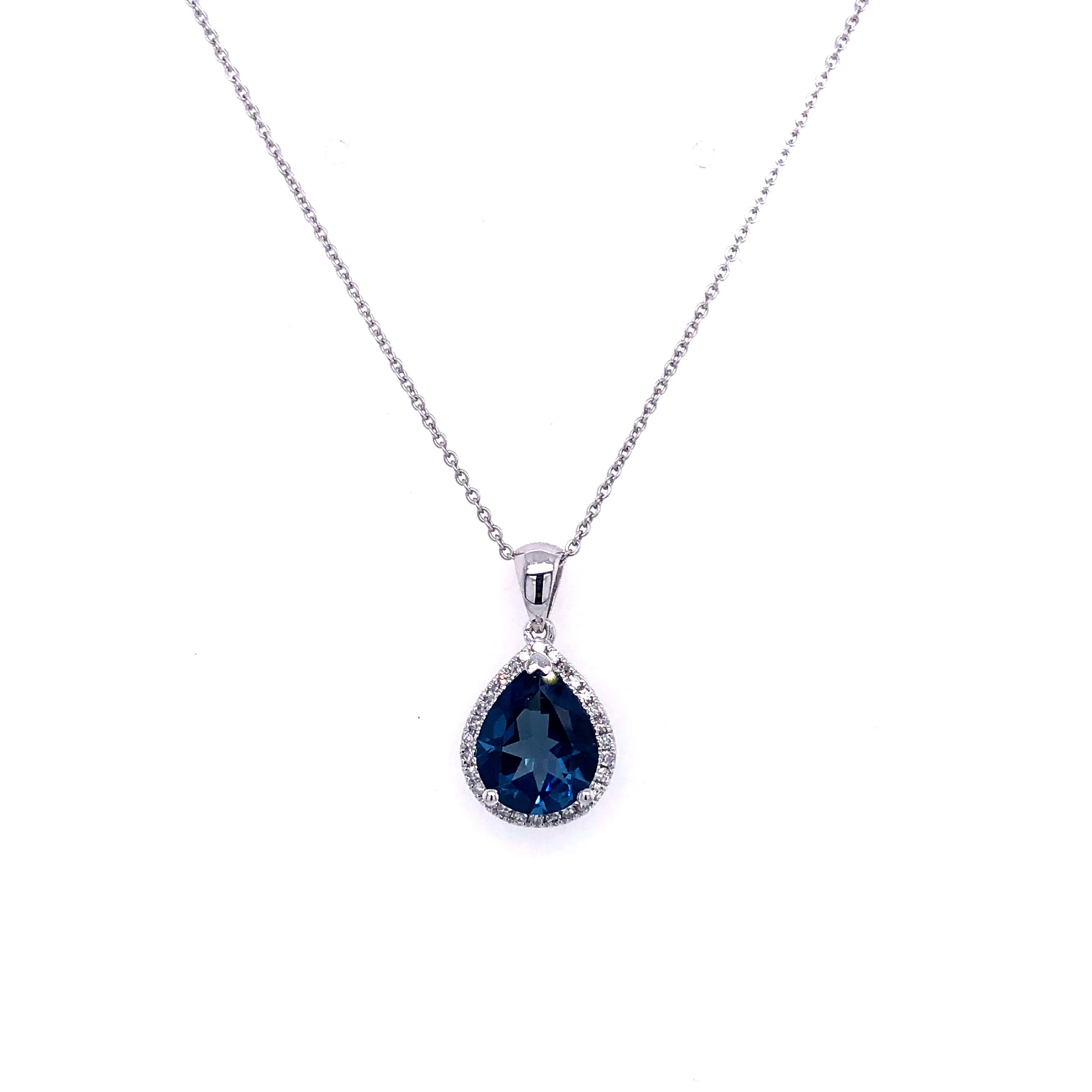 9ct White Gold Pear Shape Blue Topaz Pendant With Diamond Halo