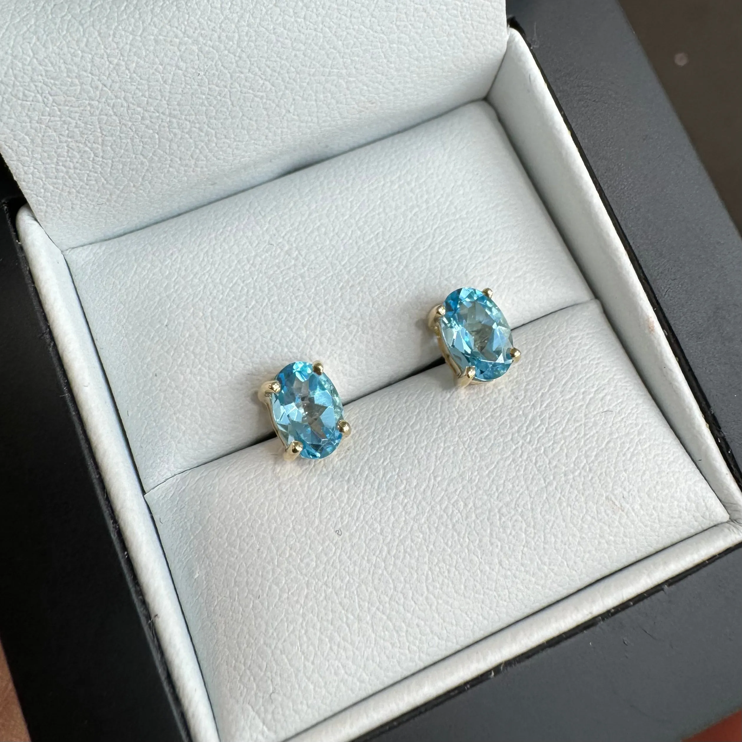 9ct Yellow Gold Oval Blue Topaz Stud Earrings